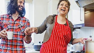 Woman and man happy at home